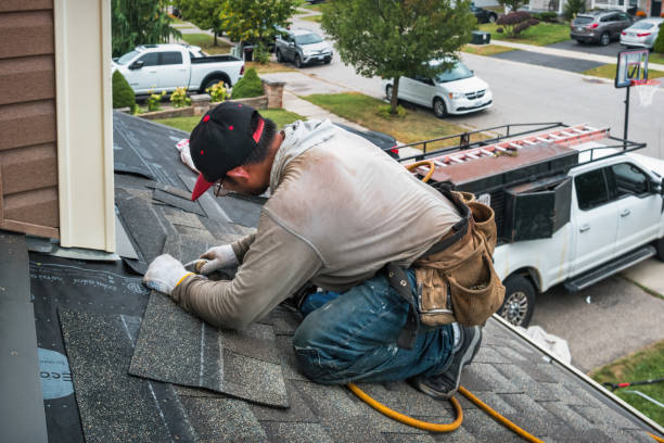 Professional Metal Roofing technician working in Six Lakes, MI